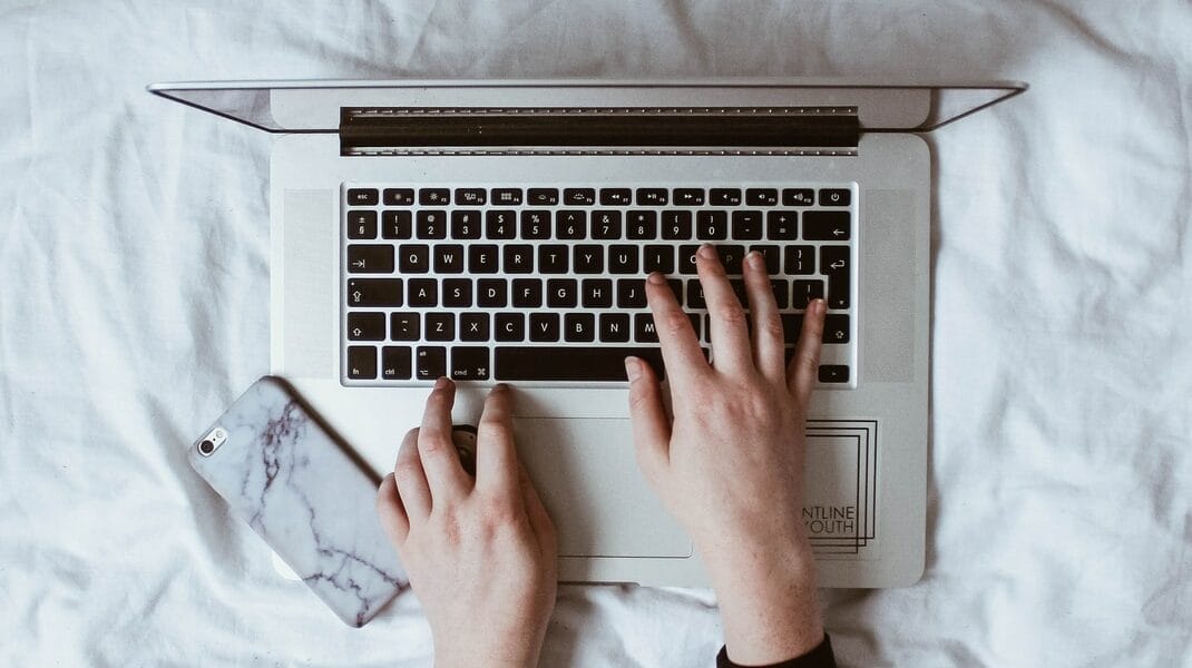 person using laptop computer